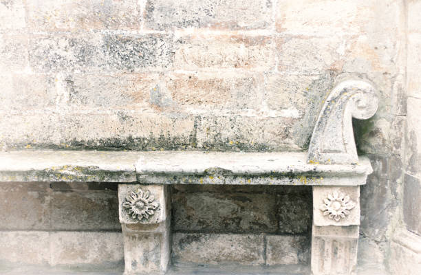 istock Sicily: Antique Baroque Bench on Old Stone Wall 689929358
