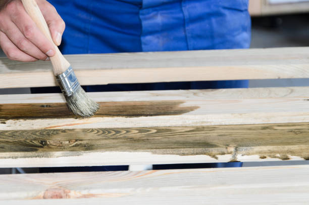 istock Painting wood for fence 689935588