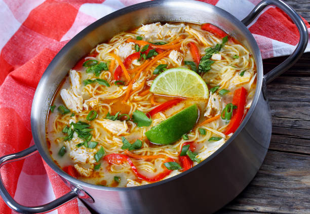 istock Thai Chicken green curry noodle soup 689936000