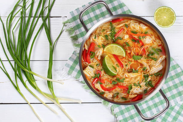 istock Thai Chicken green curry noodle soup 689936078