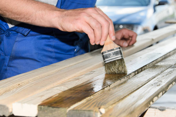 istock Painting wood for fence 689936110
