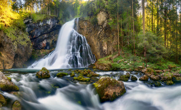 istock Waterfall with mossy rocks in Golling, Austria 689936226
