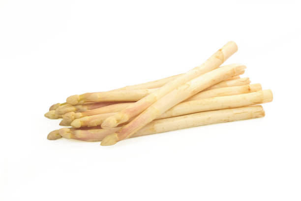 istock Organics White asparagus isolated on whit background 689940128