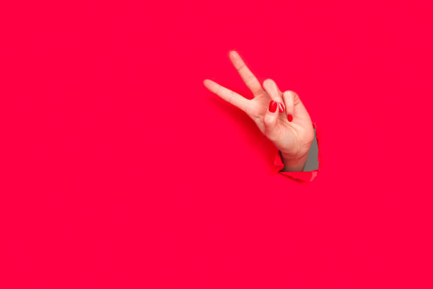 istock Crop female handshowing two fingers 689940160
