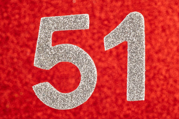 istock Number fifty-one silver over a red background. Anniversary. Horizontal 689941024