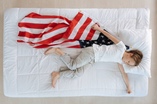 istock Pleasant nice boy dreaming of being a superhero 689943976