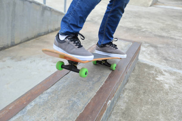 istock young woman skateboarder skateboarding at skatepark 689955656