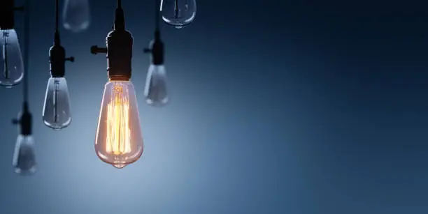 Photo of Innovation And Leadership Concept - Glowing Bulb lamp