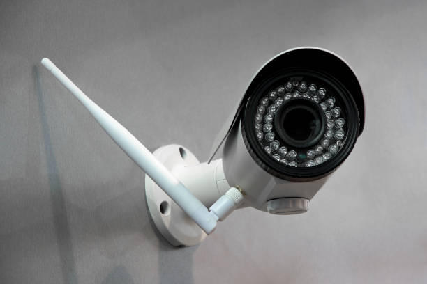 Wireless surveillance camera Wireless surveillance camera on the wall of the building soldier on the wall stock pictures, royalty-free photos & images