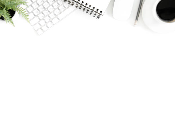 istock flat lay with workplace with computer mouse, keyboard and cup of coffee, isolated on white 689963998