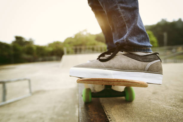 istock young woman skateboarder skateboarding at skatepark 689968242