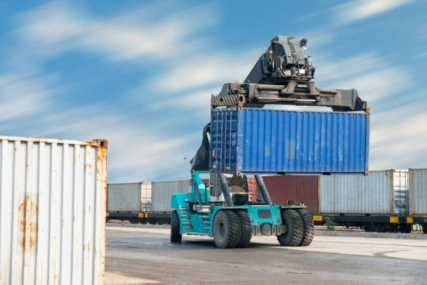 istock Container lifting truck in the storage yard. 689971960