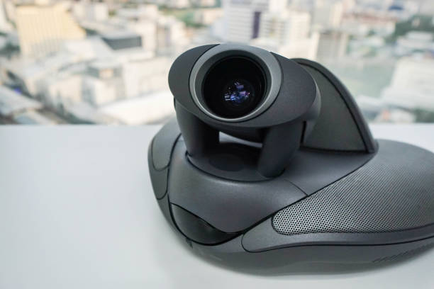 istock close up conference phone with camera on table in meeting room 689975618