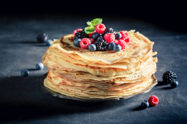 istock Delicious stack of pancakes with blueberries and raspberries 689976666