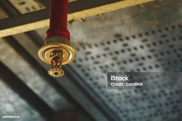 Automatic Fire Sprinkler In Red Water Pipe System Stock Photo - Download Image Now - Fire - Natural Phenomenon, Sprinkler, Protection