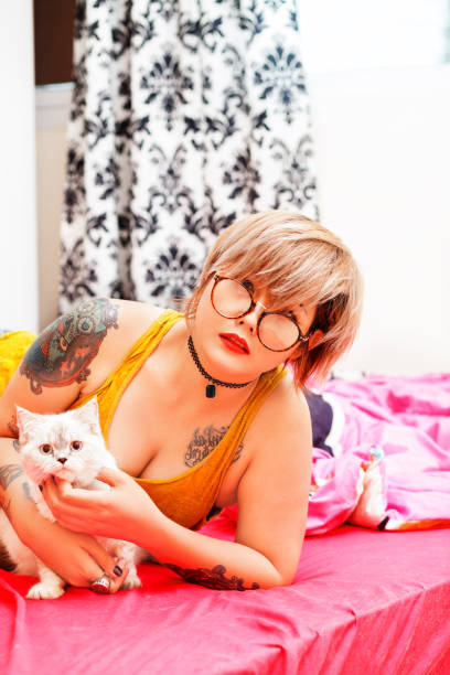istock Thai girl with white cat 689987330