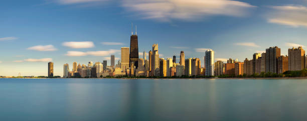 istock Chicago skyline at sunset viewed from North Avenue Beach 689993666