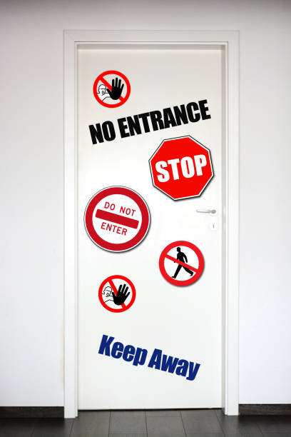 Closed white door with no entrance sings and text
