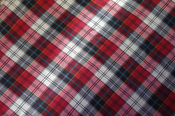 istock Viscose fabric with plaid print in red, black and white 690001992