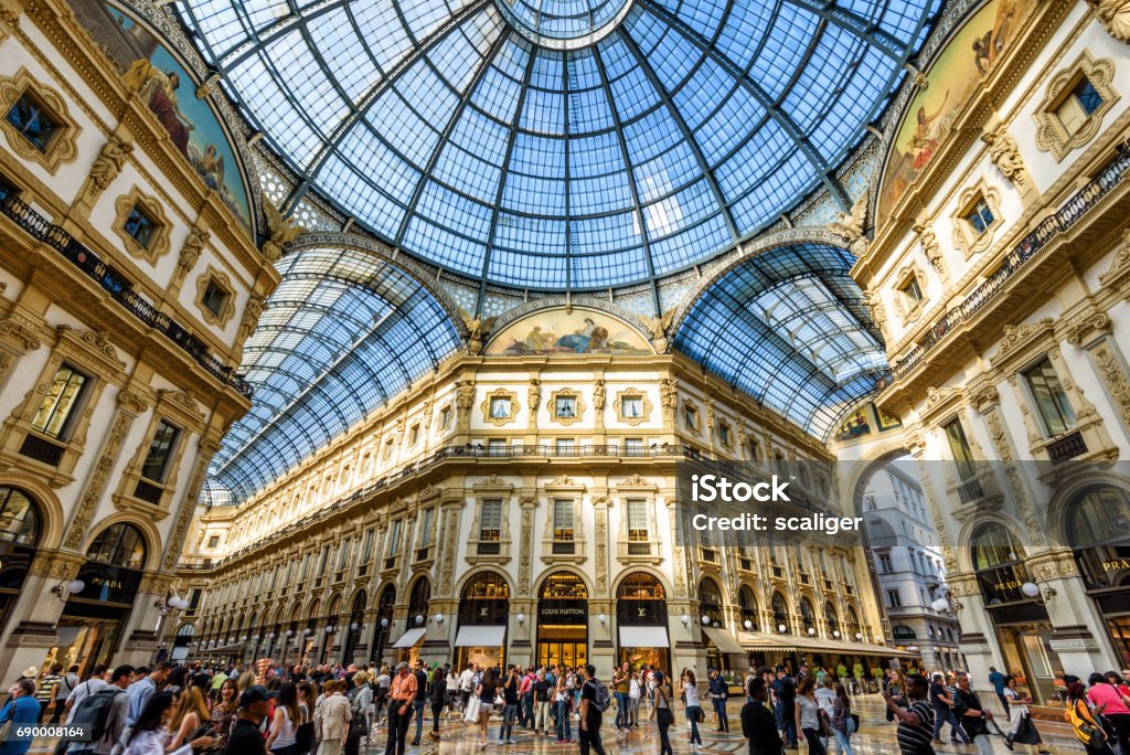 The Galleria Vittorio Emanuele II in Milan, Italy MILAN, ITALY - MAY 16, 2017: The Galleria Vittorio Emanuele II on the Piazza del Duomo in central Milan. This gallery is one of the world's oldest shopping malls. Milan Stock Photo