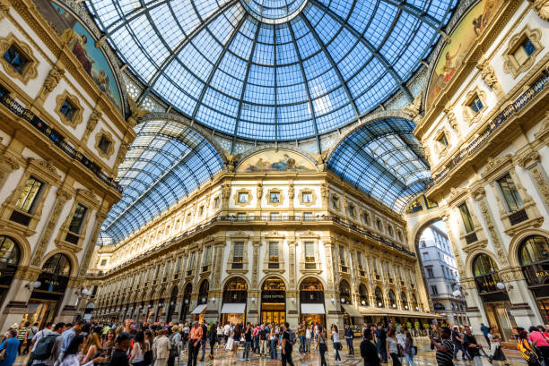 The Galleria Vittorio Emanuele II in Milan, Italy MILAN, ITALY - MAY 16, 2017: The Galleria Vittorio Emanuele II on the Piazza del Duomo in central Milan. This gallery is one of the world's oldest shopping malls. milan stock pictures, royalty-free photos & images
