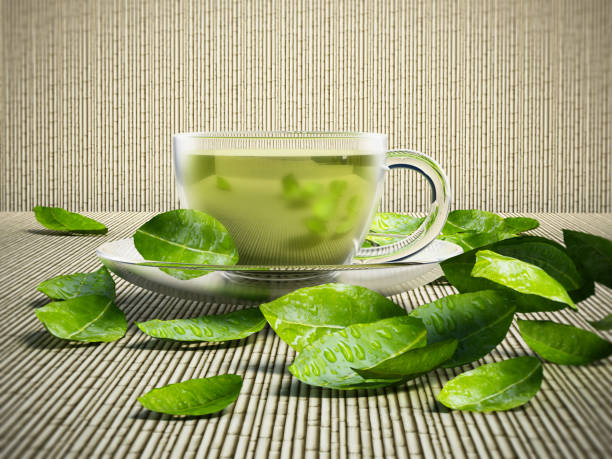 copas de cristal con té verde y té hojas aisladas en blanco - tea cup cup china saucer fotografías e imágenes de stock