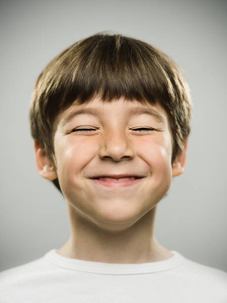 Happy little boy smiling stock photo