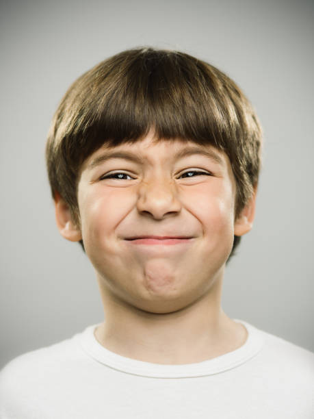 istock Close up of unhappy little boy 690021742