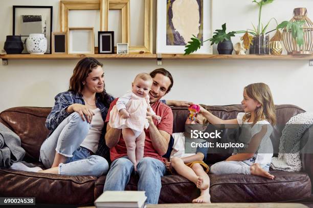 The Latest Edition To Their Family Stock Photo - Download Image Now - Family with Three Children, Family, Parent