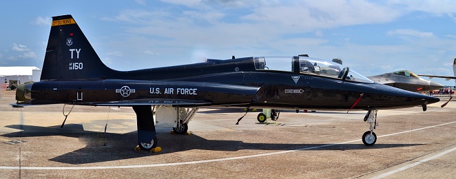 Panama City, USA - April 22, 2017: A U.S. Air Force T-38 Talon on the runway at Tyndall Air Force Base in Florida. This T-38 is used as an aggressor trainer for the 325th Fighter Wing.