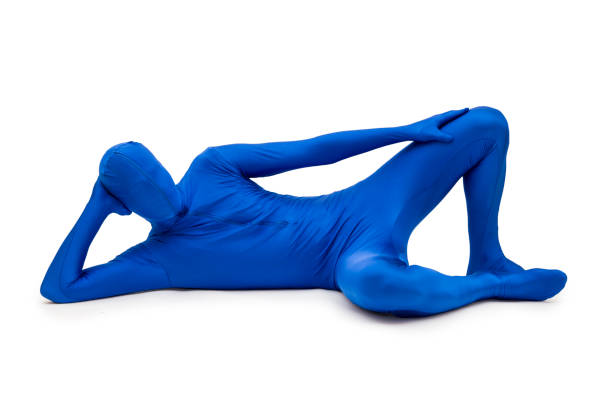 istock Mysterious blue man in costume lying on the floor 690029030