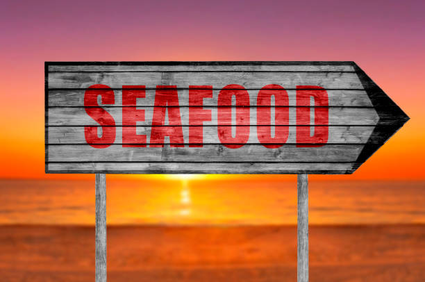 istock Red Seafood wooden sign isolatedd on white 690035988