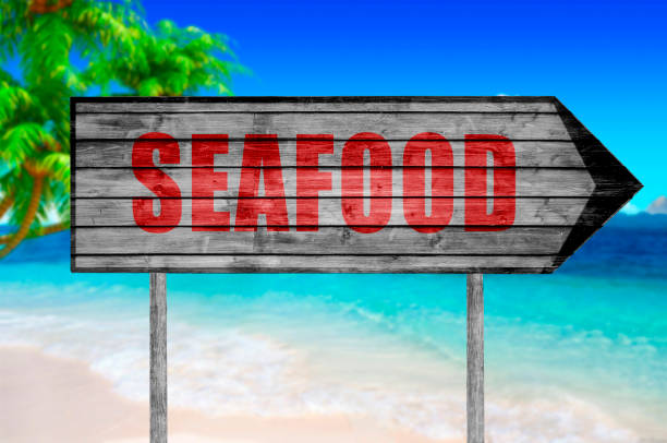 istock Red Seafood wooden sign isolatedd on white 690036032