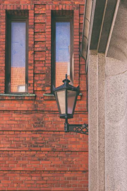 istock Street lamp on the red wall 690036364