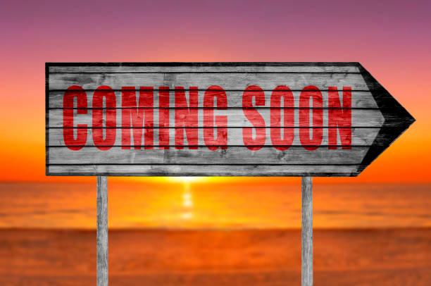 istock Red Coming Soon wooden sign isolated 690037066