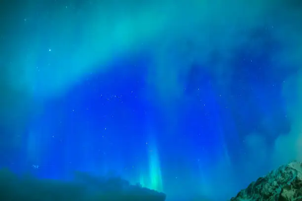 Photo of Amazing Picturesque Unique Northern Lights Aurora Borealis Over Lofoten Islands in Northern Part of Norway