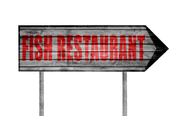 istock Red Fish Restaurant wooden sign isolated 690040148