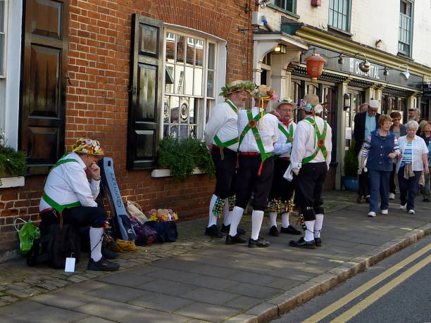 Amersham Heritage Day 2011 - Morris dancers Amersham, United Kingdom - September 11, 2011: Amersham Heritage Day. It is an annual family friendly event, very popular among residents and visitors. It takes place in Amersham Old Town, Buckinghamshire, UK in September. amersham stock pictures, royalty-free photos & images