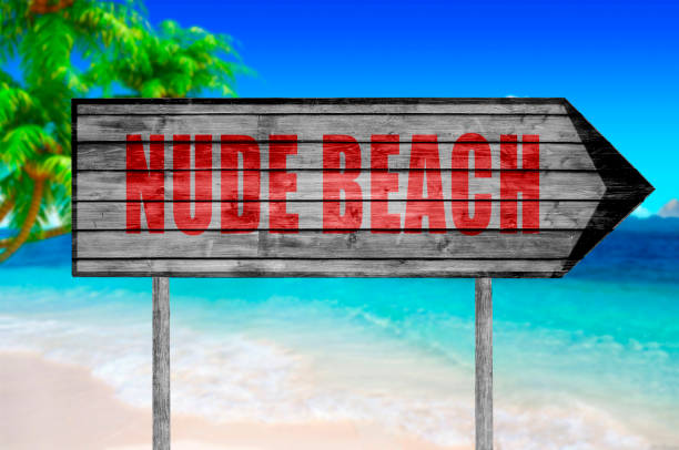istock Red Nude Beach wooden sign isolated 690044420