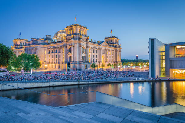 istock Berlin government district with Reichstag and Spree river in twilight, central Berlin Mitte, Germany 690050784