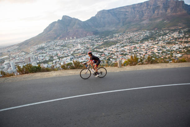 istock Female cyclist out on a training ride above the city 690053720