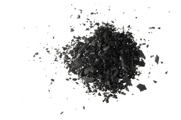 istock Pile of Carbon charcoal  dust isolated on white background 690064422