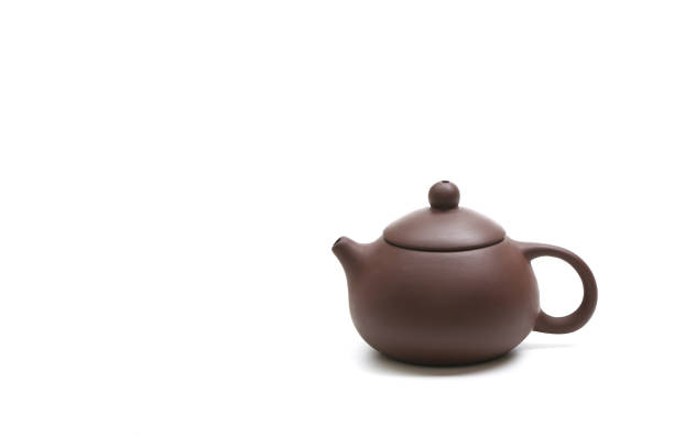 istock purple clay teapot isolated on white background 690073170