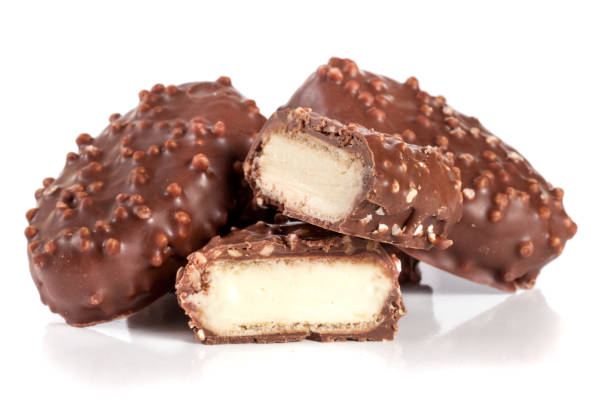 istock chocolate candy with white cream filling isolated on white background 690080290