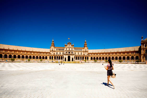 Seville, Andalusia, Spain - May 14, 2013: Plaza del Altozano with monument 1994 by Jesus Gavira Alba 'Triana al arte flamenco'
