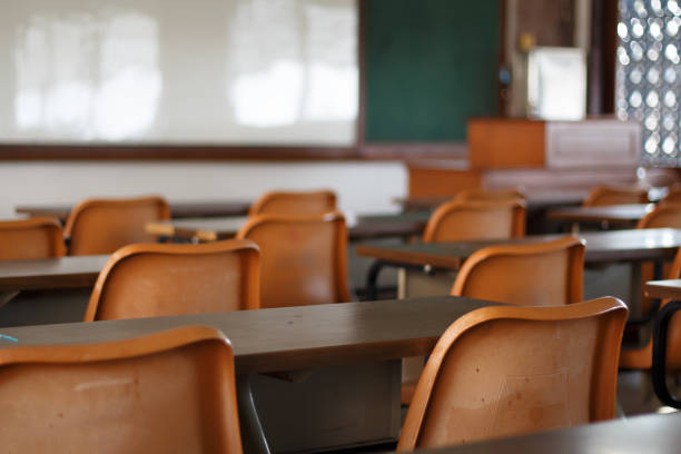 istock Lecture room with empty seats Business seminar education 690100080