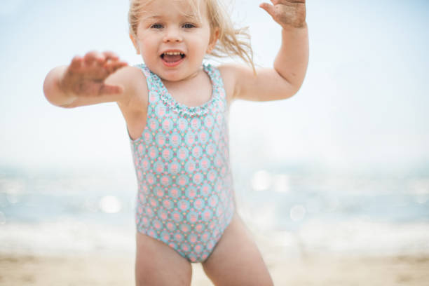 istock girl at the beach 690106732