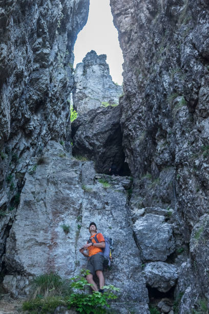istock Hiker in canyon trail 690115612