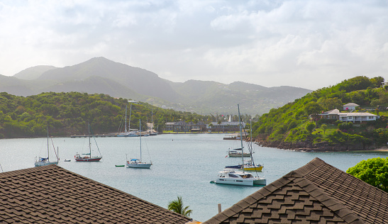 Antigua, English Harbour panoramic view with boats and yachts. View include Freeman bay and beach