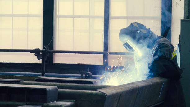 istock Welder at work in metal industry 690120318